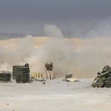 Popular Mobilization Force members on the frontline with the Islamic State in al-Fatha, northeast of Baiji, Iraq on October 18, 2015.