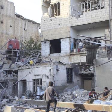 Children in the rubble of damaged buildings in the eastern Damascus suburb of Ghouta, Syria. 