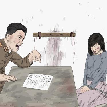 보위성 심문관에게 조사를 받고 있는 여성의 모습