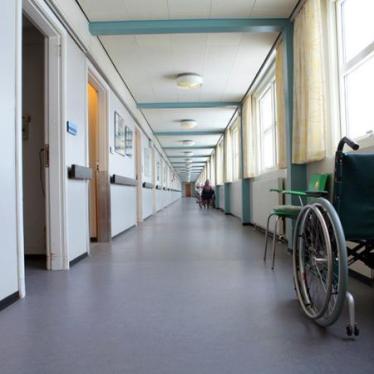 Wheelchair in the hallway of a care facility. 