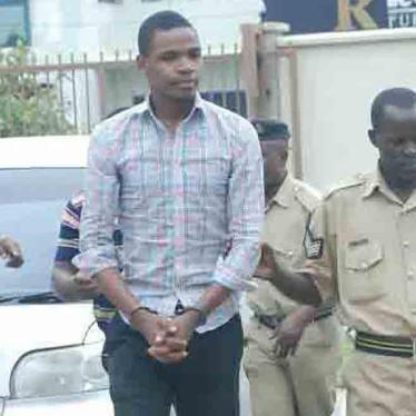 Prison guards escort Bob Chacha Wangwe to the Kisutu Magistrates Court in Dar es Salaam, May 11, 2016.